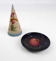 A Clarice Cliff conical sifter (hairline at top, together with a small Moorcroft circular dish (2)