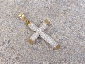 A large 9ct gold stone-set cross pendant - 7.5 cm drop including bale (gross weight 14.1g).