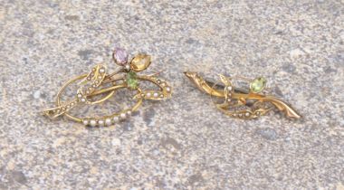 An Edwardian 9ct gold, peridot, amethyst, citrine and seed pearl floral brooch - unmarked, tests