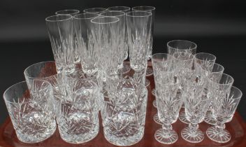 A part-suite of cut glass drinking glasses - possibly Galway Glass, all with star cut bases,