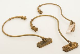 A set of three gilt-brass curtain tie-backs - first half 20th century, in the 19th century style,