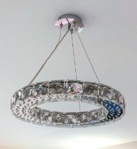 A set of three cut glass and jewelled halo style pendant ceiling lights