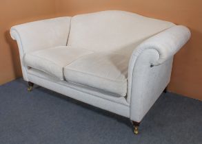 A Laura Ashley Home cream upholstered two-seater sofa - LWH 168 x 94 x 85 cm, in very good