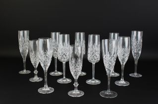 A harlequin set of cut glass champagne flutes - including a set of five Edinburgh Crystal flutes,