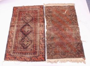 Two antique tribal rugs, probably Afghan - both first half 20th century, heavily worn with some