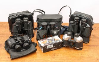 A collection of binoculars - all but one pair cased, including example by Celestron, Bresser,