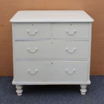 A Victorian white painted chest of drawers - of small proportions, the moulded top over two short