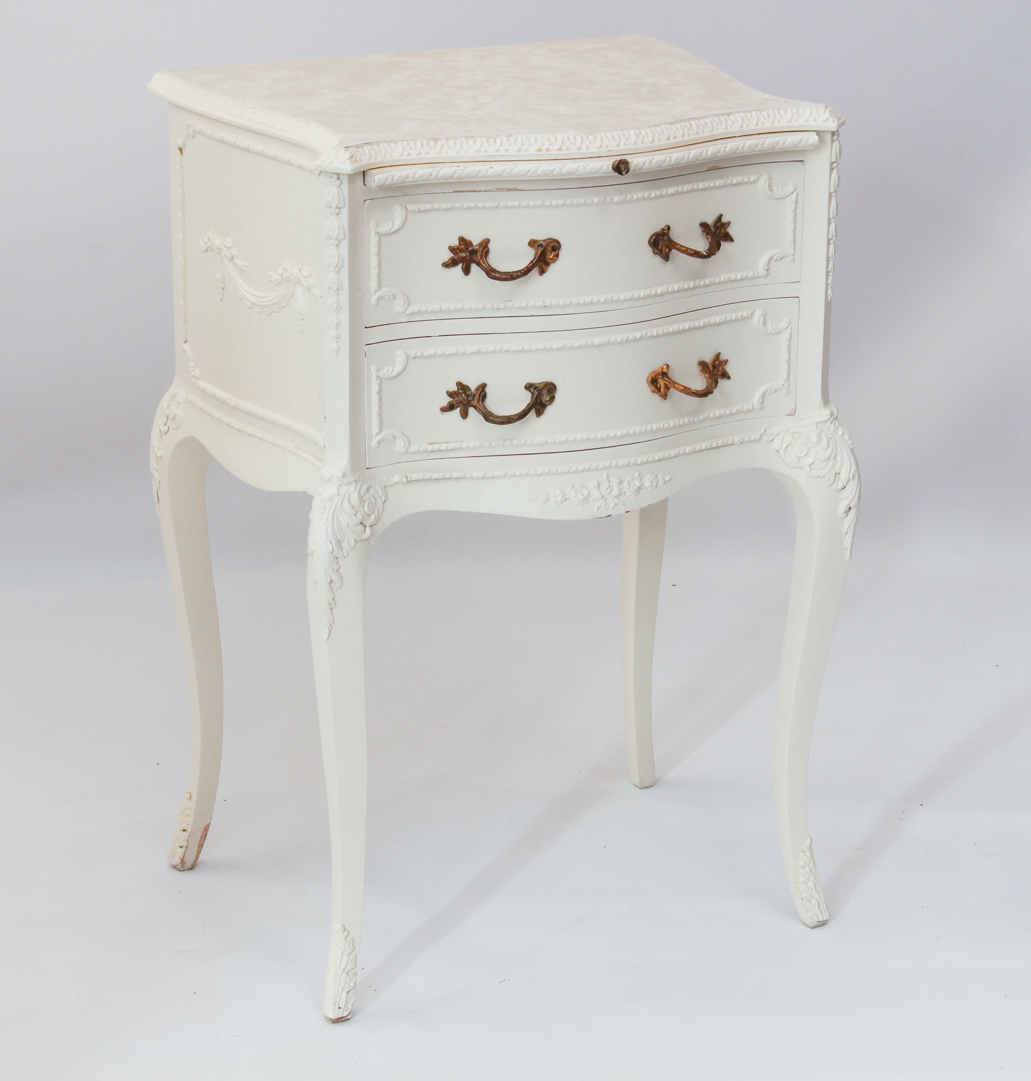 A white painted serpentine bedside table in the Louis XV taste - 1950s-60s, the marbled Formica