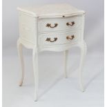 A white painted serpentine bedside table in the Louis XV taste - 1950s-60s, the marbled Formica