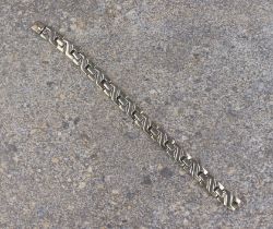 A silver X-link bracelet - stamped '925', 17.25 cm long.