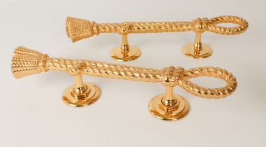 A pair of decorative gilt-brass door-pulls by 'House of Gold' - modern, in the form of knotted