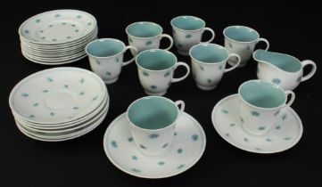 A Susie Cooper 1950s-60s part coffee service - in the blue 'One o'clocks' pattern, comprising six