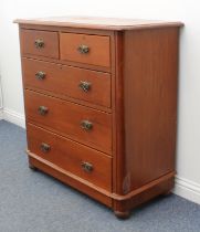 A Victorian straight-front mahogany chest of drawers - the moulded top over two short and three long