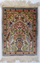 A miniature Kashmir silk tree of life rug - late 20th century, 45.5 x 33 cm.