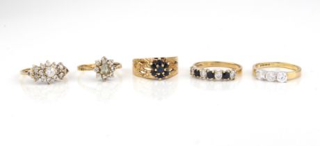 Five 9ct gold stone-set rings (gross weight 12g)