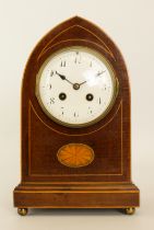 An Edwardian fiddleback mahogany and marquetry mantel clock - with half hour striking, eight day