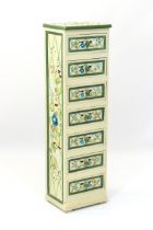 A painted narrow chest of seven drawers - late 20th century, painted with flowers and lattice work