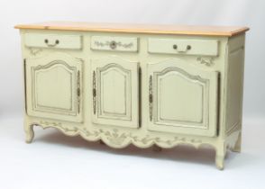 A French style painted and pine buffet - to match the table and chairs (lot 412), the moulded top