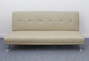 A modern buttoned faux-leather convertible sofa / daybed - raised on tubular chrome feet, 177 cm