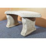 A composite stone curved garden seat - three-part, decorated with ivy leaves and trailing flowers,
