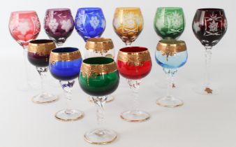 A set of six coloured cased glass wine glasses - probably Bohemian, 1970s-80s, the six bowls in