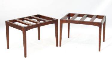 A pair of stained beech slat-top luggage racks - raised on square tapered supports (LWH 58.5 x 43