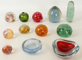 A small collection of glass paperweights - including two two Victorian dumps; a Caithness Crucible