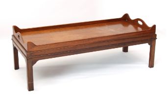 A Georgian style mahogany tray-top coffee table - second half 20th century, rectangular with pierced