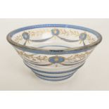 A late Victorian or Edwardian intaglio-cut blue and parcel-gilt glass bowl - possibly by Stevens &