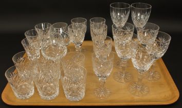 A set of six cut glass whisky tumblers - slightly flared with diamond and blaze cut decoration, 8.