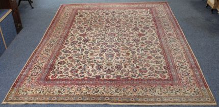 A large, good quality Kashan style hand-knotted wool rug - probably mid-20th century, the central