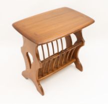 An Ercol Windsor Canterbury or magazine rack table - original maker's labels to underside (LWH 55