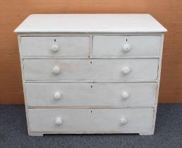 A Victorian white painted chest of drawers - the moulded top over two short and three long graduated