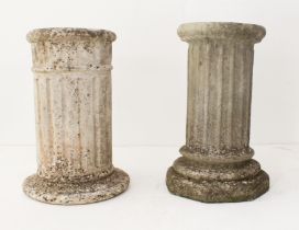 A pair of composite stone fluted columns - 49 cm high.