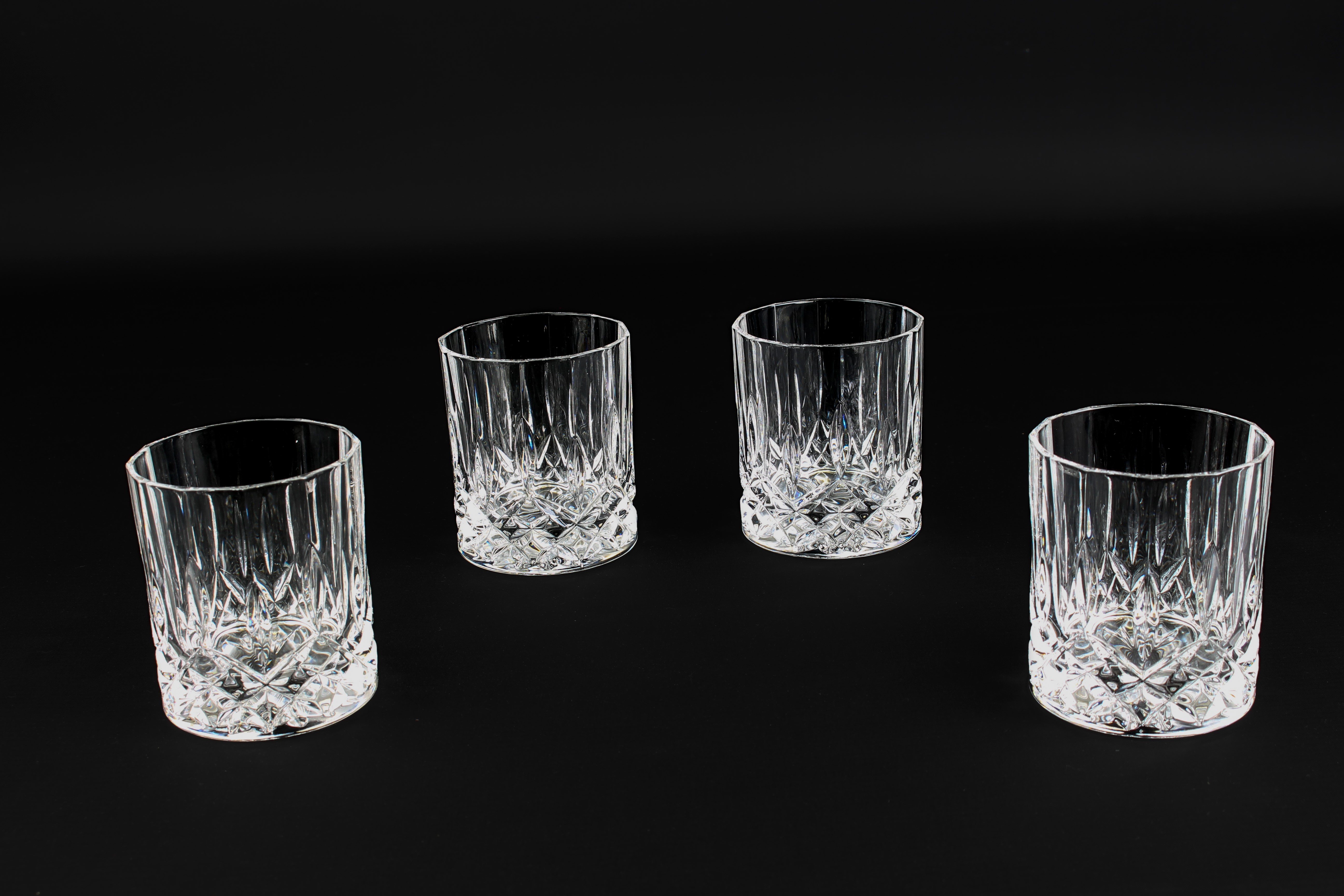 A pair of Galway cut glass champagne flutes - etched factory mark, 20.6 cm high; together with a set - Image 4 of 4