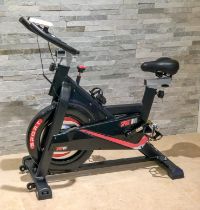 A Sport exercise bike with SPD, DST, CAL, ODO and PULSE monitor.