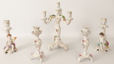 A three-piece porcelain candelabra and candlestick garniture - late 20th century, the four-light