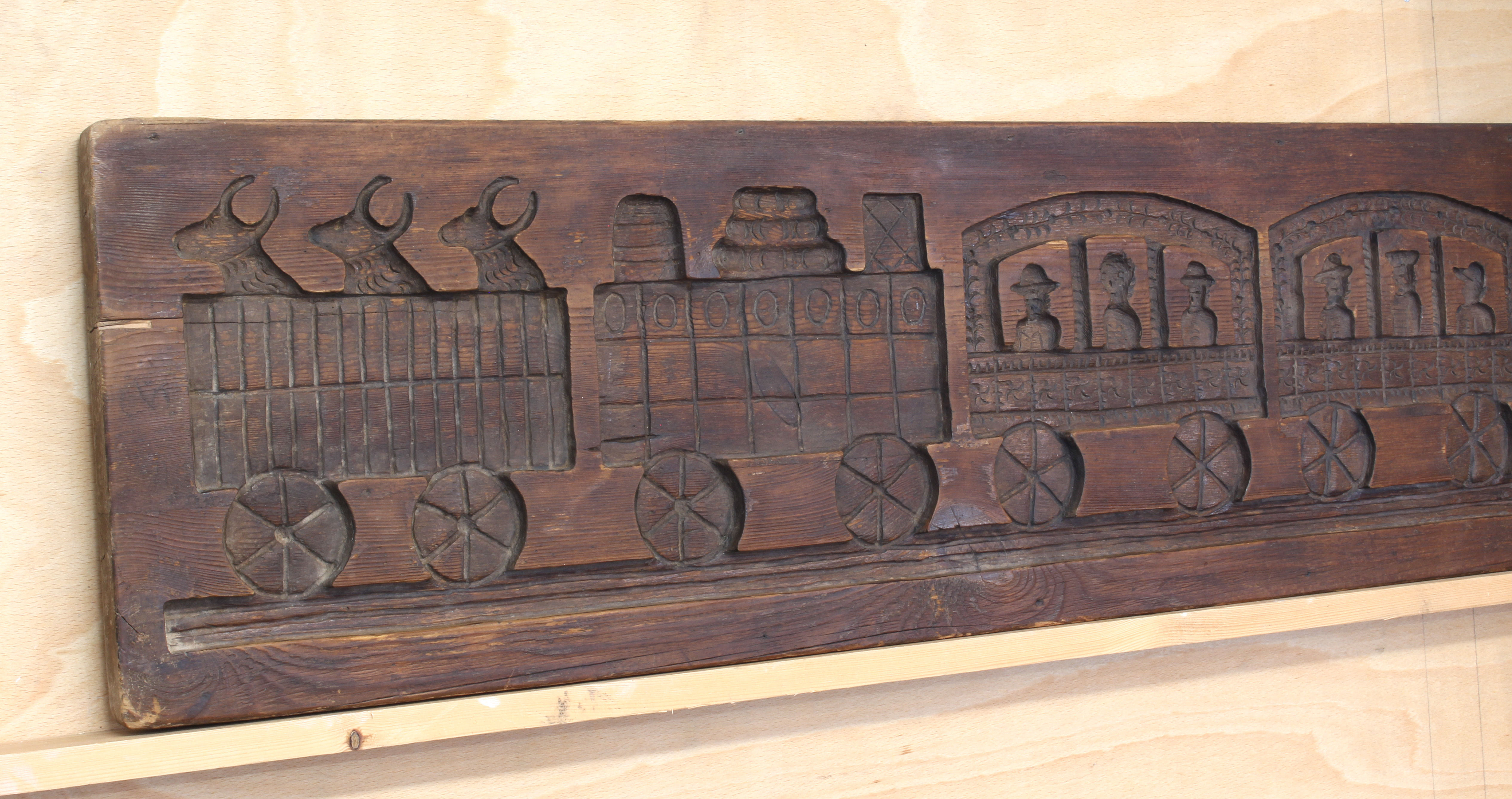 A vintage stained pine panel or mould carved in counter-relief with a steam train - 'Etna', with two - Image 3 of 4