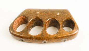 A late 19th century knuckle duster