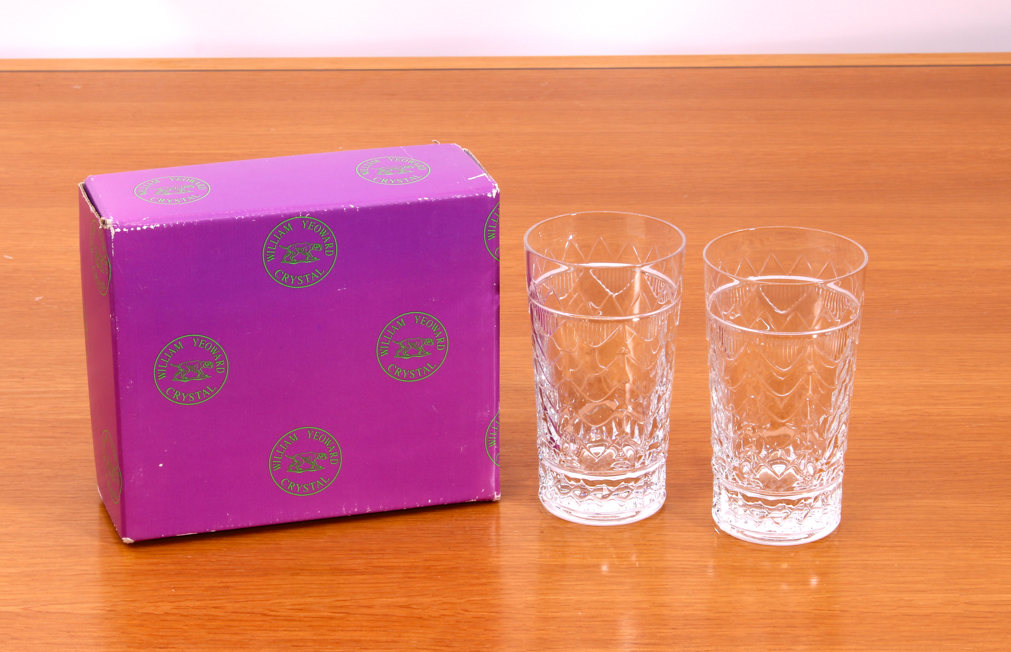 A boxed pair of William Yeoward Crystal Hi-Ball Tumbler glasses - etched marks to base, 14.5 cm