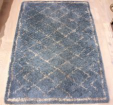 A pair of Mint 'Grace Loft' shag pile rugs - 120 x 70 cm.