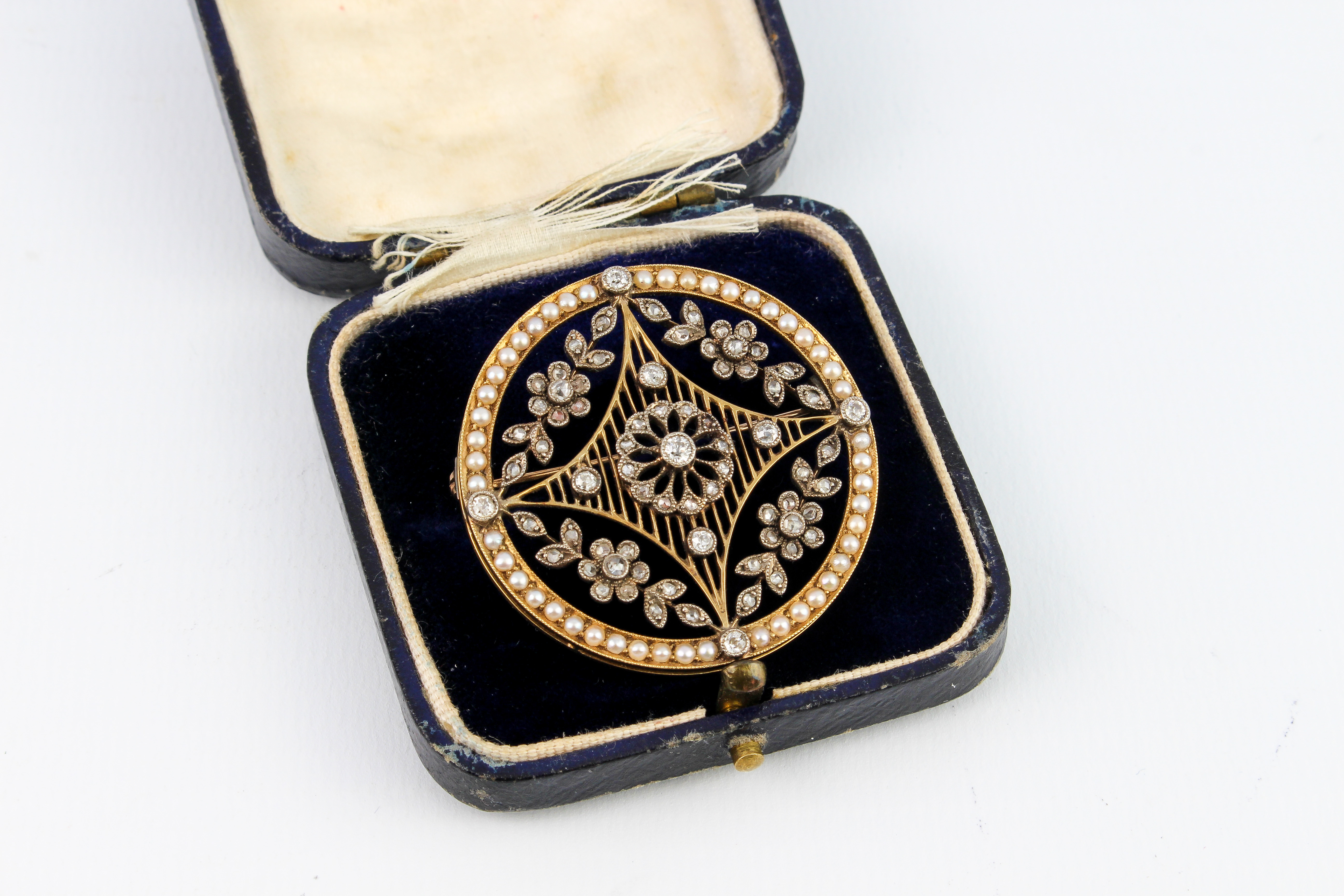 A fine Edwardian Belle Epoque 18ct gold, silver, seed pearl and diamond target brooch - unmarked but