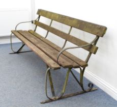 A wrought iron and hardwood slatted garden bench - 198 cm long. (similar to lot 548)