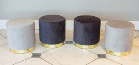 A set of four drum-form stools - modern, upholstered in dark and light grey (two of each), on gilt