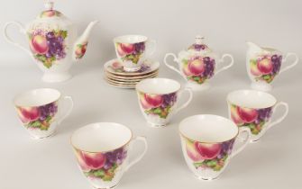 A Kirsty Jane China bone china tea service - comprising six tea cups and saucers, teapot, milk jug