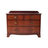 An Edwardian straight front cross-banded mahogany low chest of drawers - the moulded top with