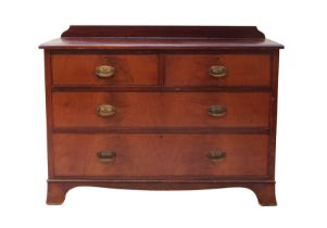 An Edwardian straight front cross-banded mahogany low chest of drawers - the moulded top with