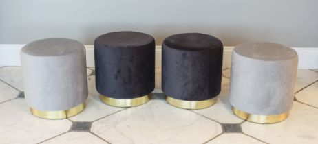 A set of four drum-form stools - modern, upholstered in dark and light grey (two of each), on gilt