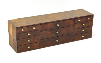 A late 19th / early 20th century oak workman's tool chest - rectangular form, with a bank of three