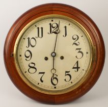 An Edwardian mahogany eight-day school or station-style clock - with twin train movement, striking